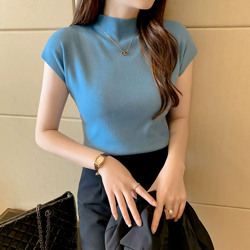 Camiseta negra de punto de manga corta para mujer, sin mangas, con cuello medio alto, de seda helada, moderna y versátil, de corte ajustado y favorecedora. Azul imagen 1