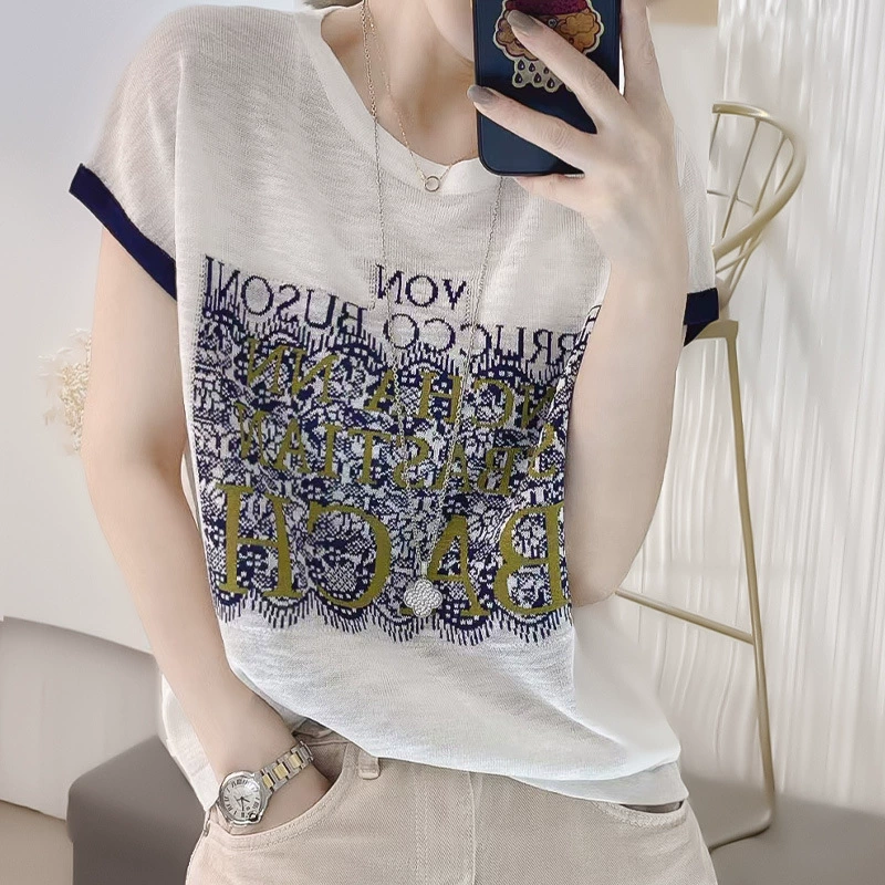 Camiseta de punto de manga corta con estampado de letras en bloques de color, estilo europeo, moderna y resistente, para mujer, moda de verano 2024. Blanco imagen 1